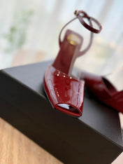 LA SCANDALE HIGH 10 CM WEDGE SANDALS IN CRIMSON RED PATENT LEATHER