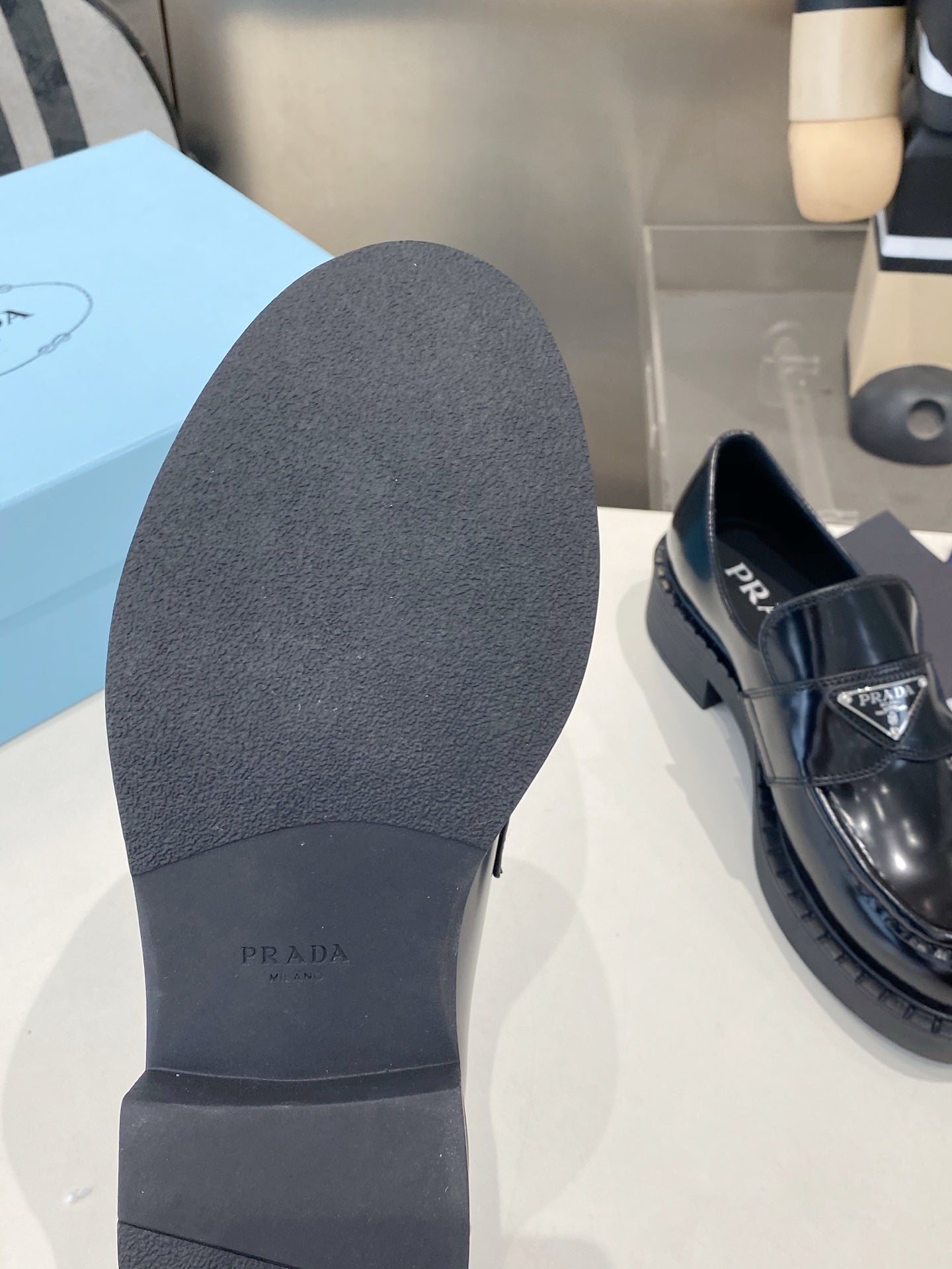 PRADA 26S LOAFERS IN BLACK CALFSKIN WITH LOGO SILVER HARDWARE