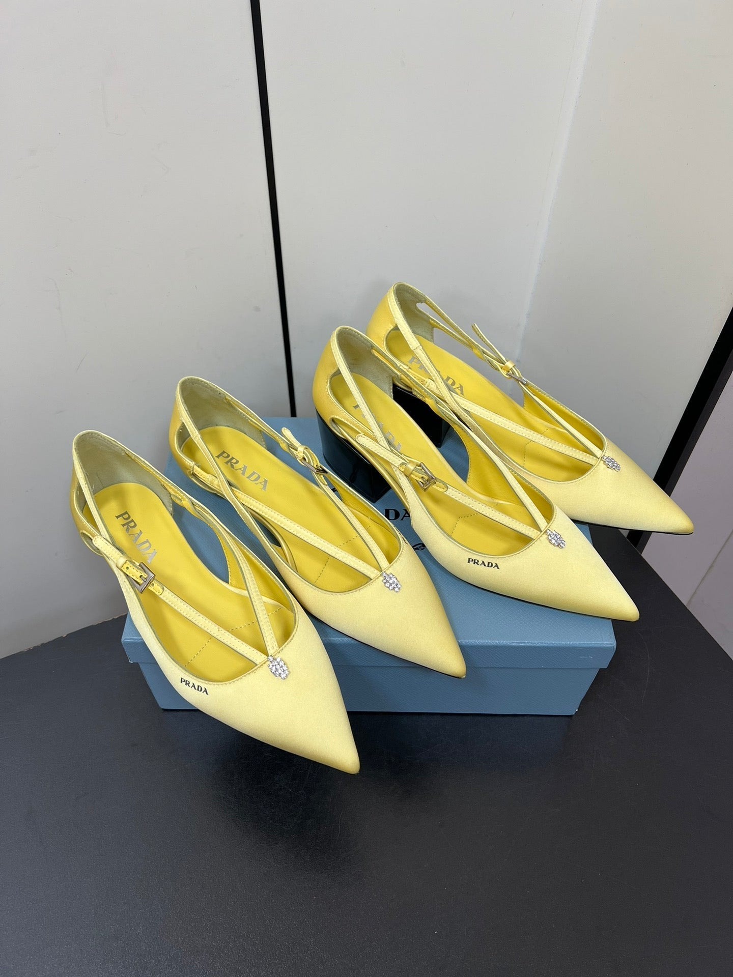 CUT-OUT PUMPS WITH BEAD BUCKLE IN LIGHT YELLOW SATIN
