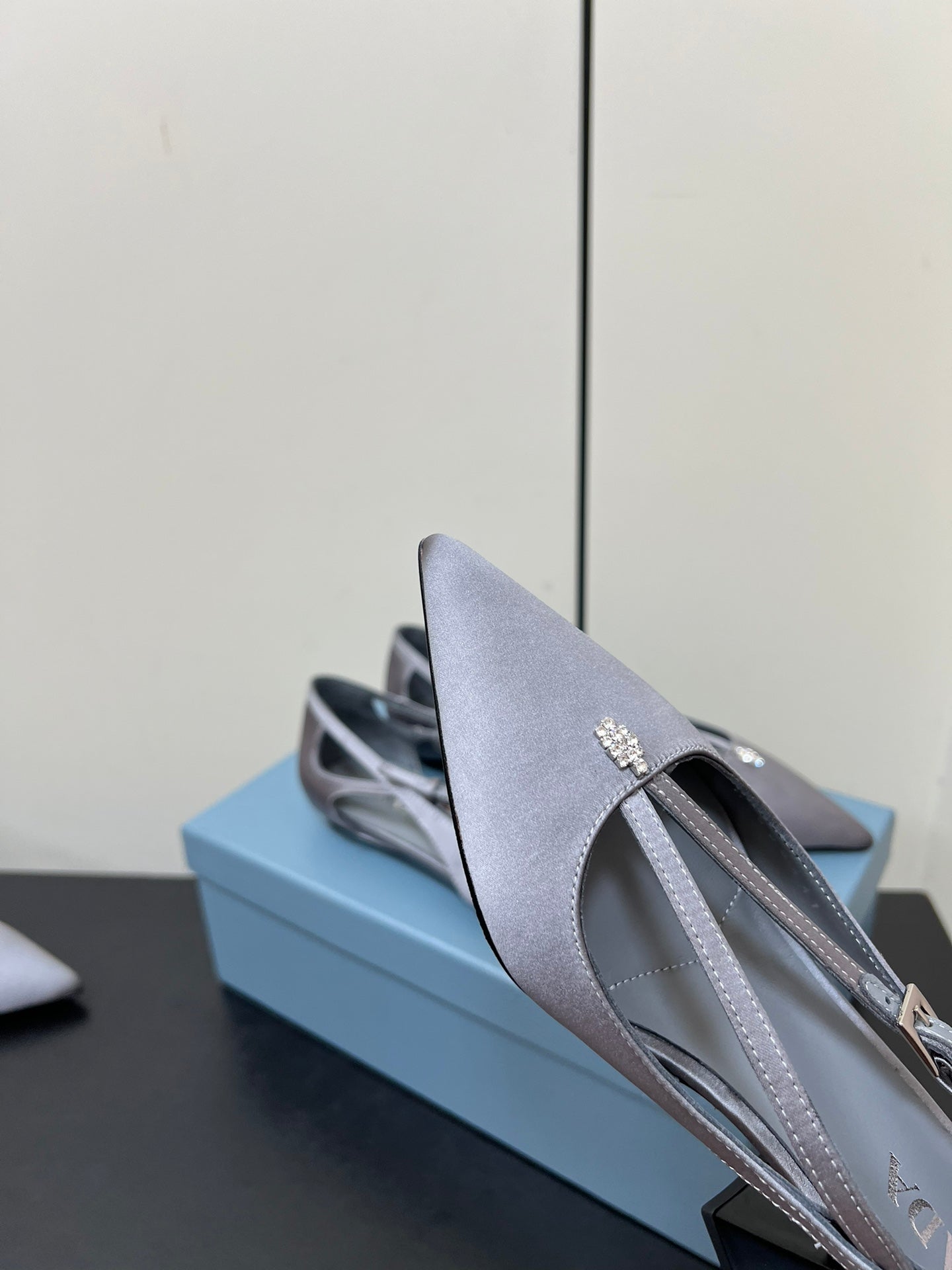 CUT-OUT BALLERINA FLAT IN WARM GRAY SATIN ATTACHED BEAD BUCKLE