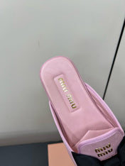BOW MULES IN DUST PINK SUEDE
