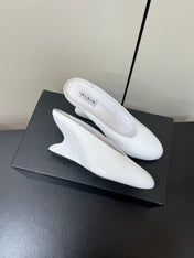 ALAIA WEDGE MULES 25S IN CREAM WHITE LAMBSKIN