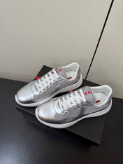 PRADA 26S SNEAKERS IN SILVER CALFSKIN AND WHITE MESH