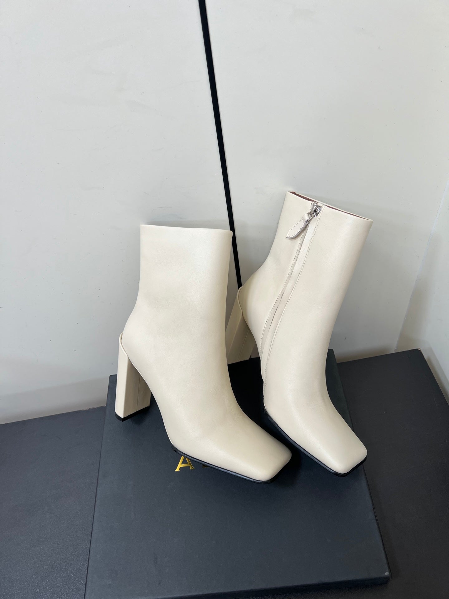 ALAIA 26S SQUARE-TOE BOOTS IN WHITE CALFSKIN