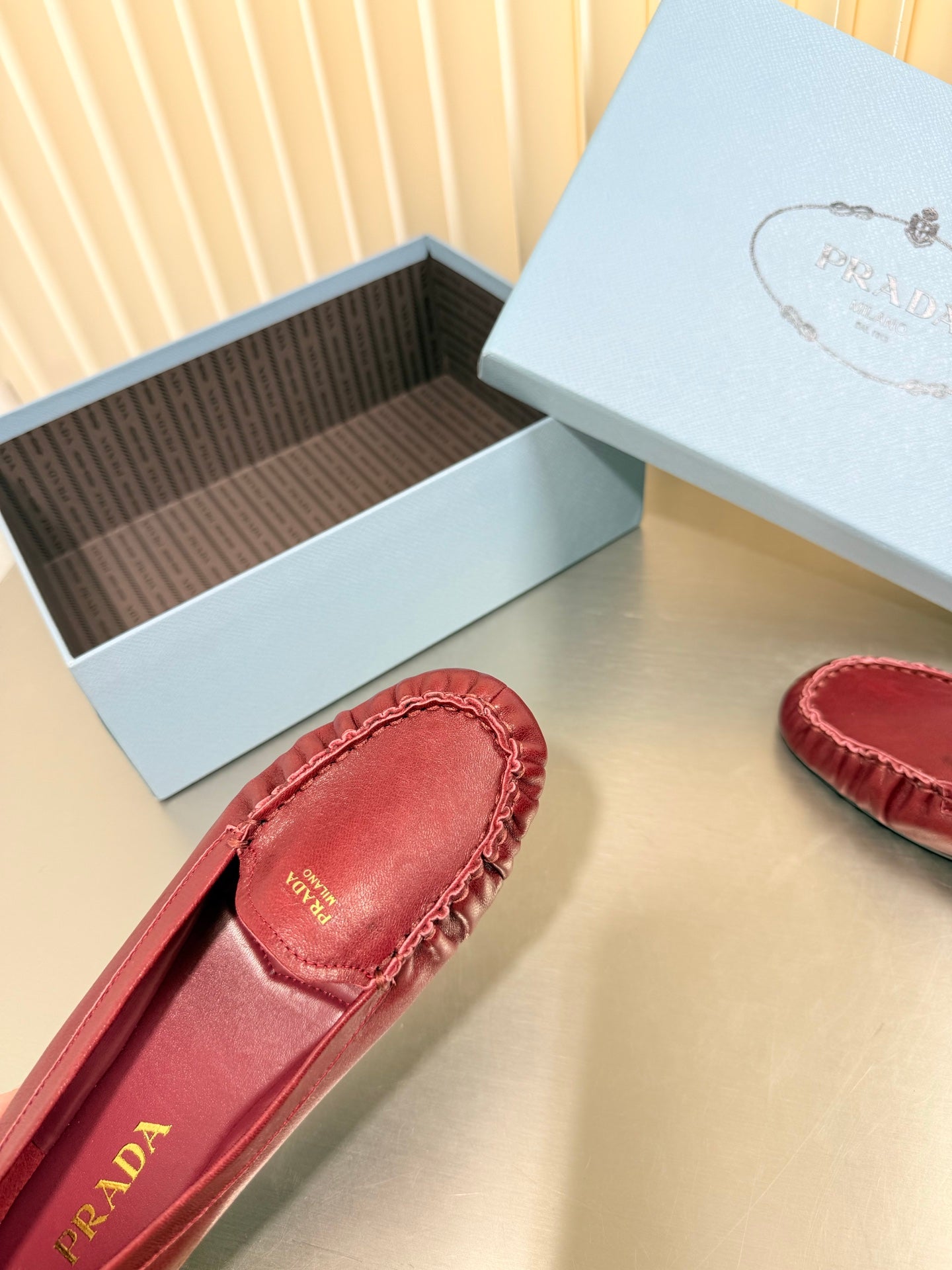 PRADA 26S CLASSIC LOAFERS IN DARK RED LAMBSKIN