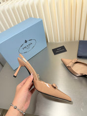 PRADA 26S POINTED-TOE SLINGBACK PUMPS IN BEIGE PATENT CALFSKIN WITH BOW