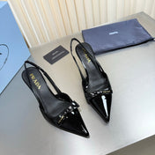 PRADA 26S POINTED-TOE SLINGBACK PUMPS IN BLACK PATENT CALFSKIN WITH BOW