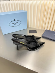 PRADA 26S POINTED-TOE SLINGBACK PUMPS IN BLACK PATENT CALFSKIN WITH BOW