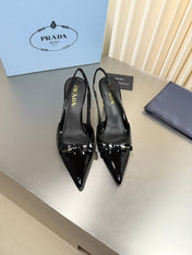 PRADA 26S POINTED-TOE SLINGBACK PUMPS IN BLACK PATENT CALFSKIN WITH BOW