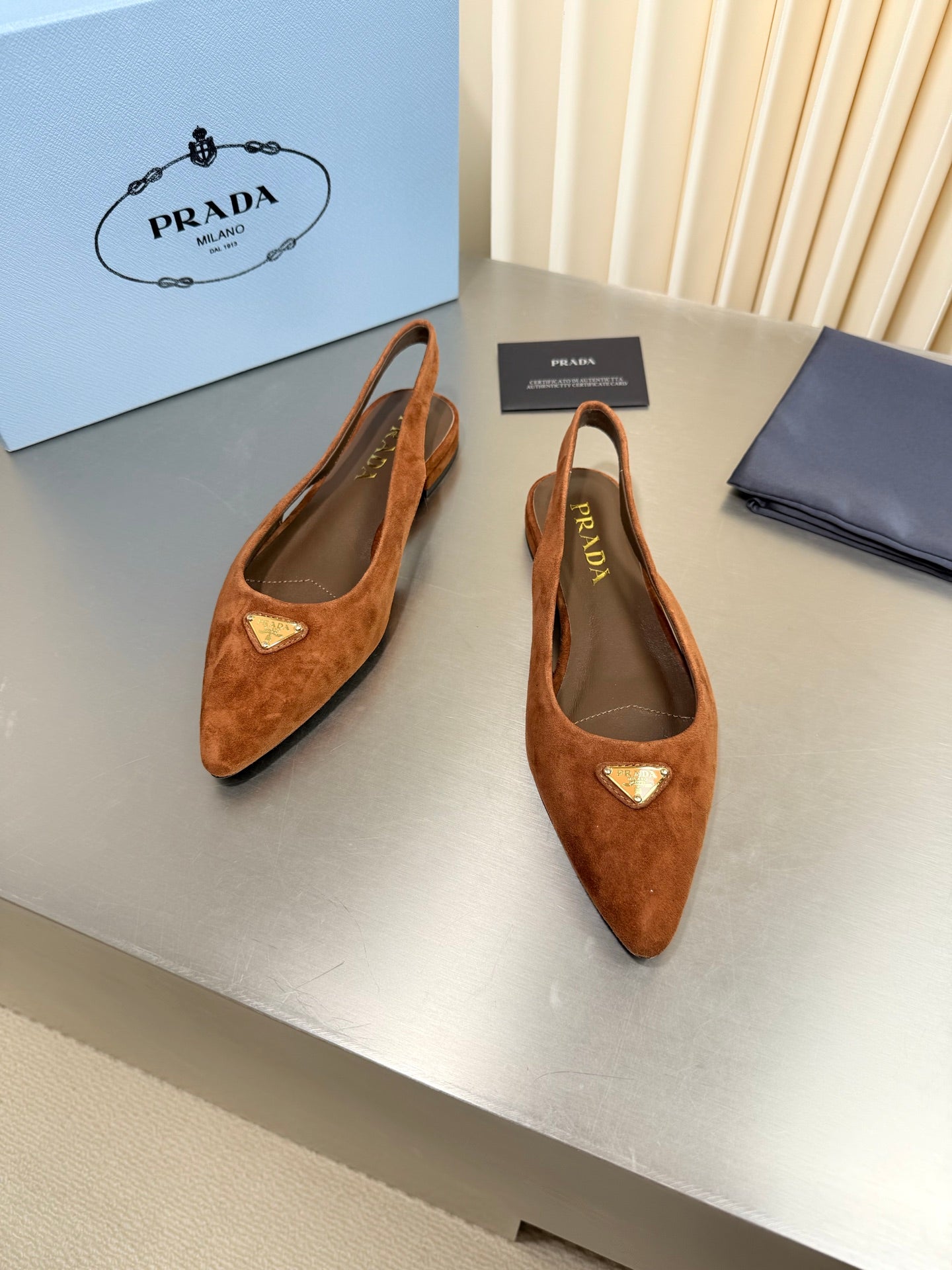PRADA 26S SLINGBACK FLATS IN COGNAC BROWN SUEDE WITH GOLD HARDWARE