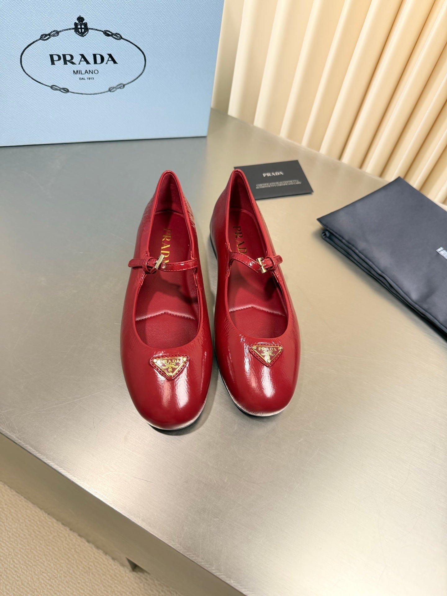 PRADA 26S MARY JANE FLATS IN RED CALFSKIN