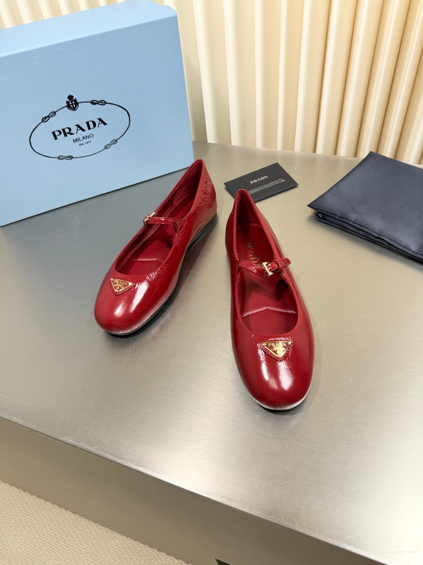 PRADA 26S MARY JANE FLATS IN RED CALFSKIN