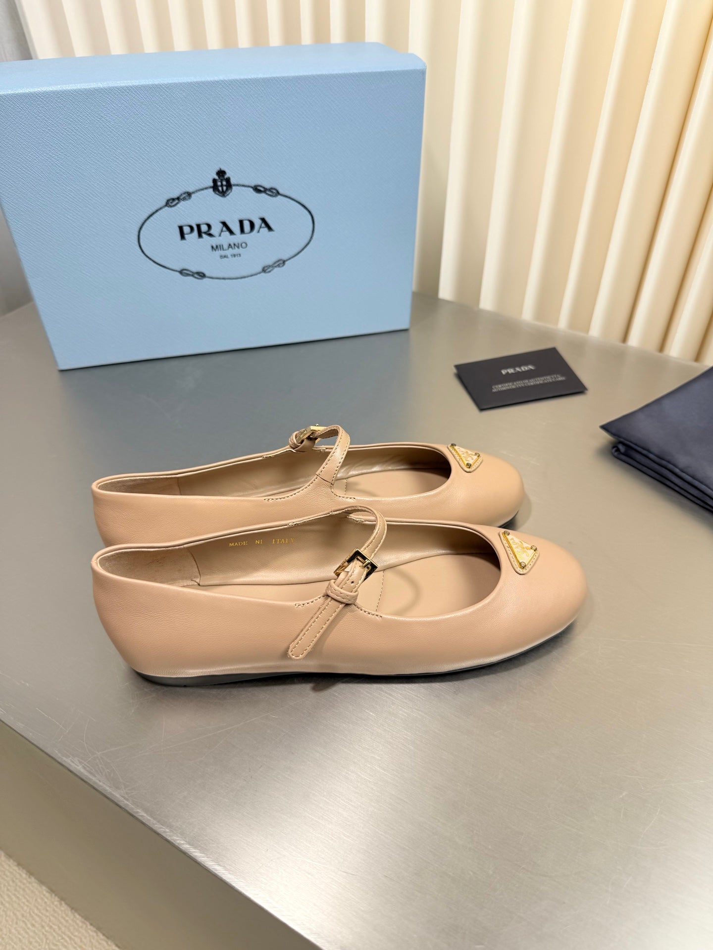 PRADA 26S MARY JANE FLATS IN BEIGE CALFSKIN