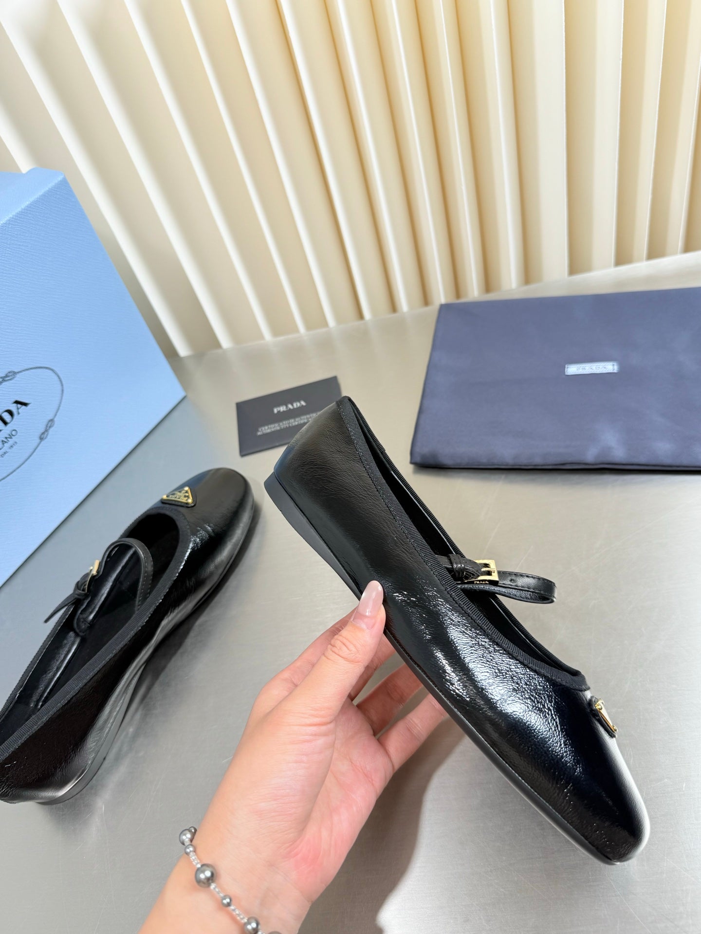PRADA 26S MARY JANE FLATS IN BLACK SHINY CALFSKIN