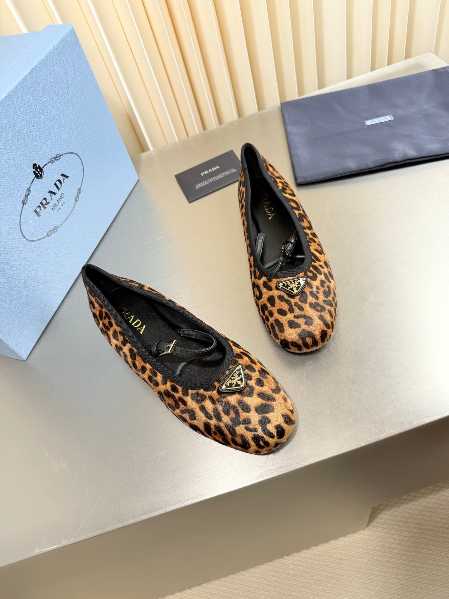 PRADA 26S MARY JANE FLATS IN LEOPARD-PRINT PONY HAIR