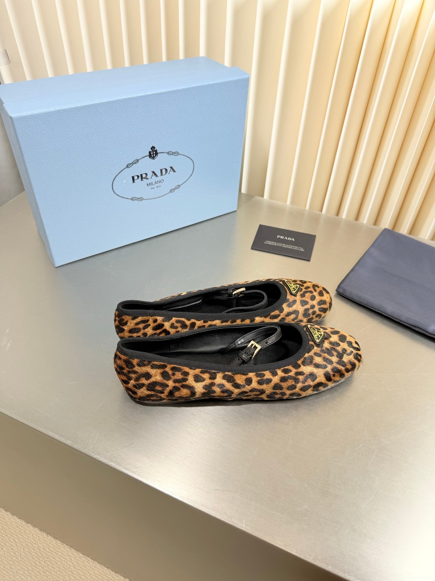 PRADA 26S MARY JANE FLATS IN LEOPARD-PRINT PONY HAIR