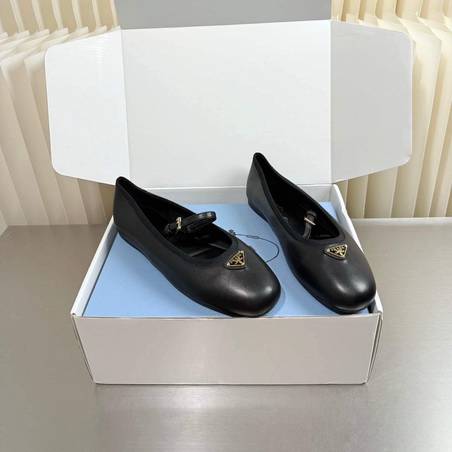 PRADA 26S MARY JANE FLATS IN BLACK CALFSKIN