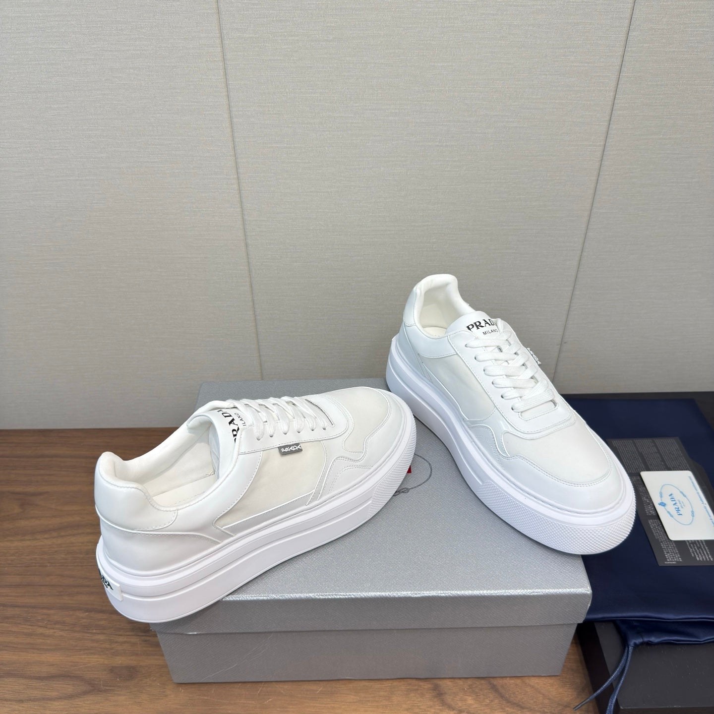 PRADA 25S DOWNTOWN BOLD SNEAKERS 45MM IN WHITE CALFSKIN