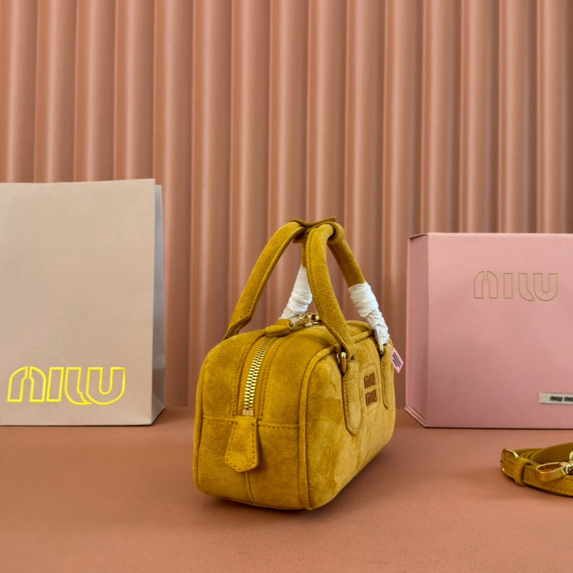 ARCADIE BAG 22 IN MUSTARD YELLOW SUEDE GOLD HARDWARE