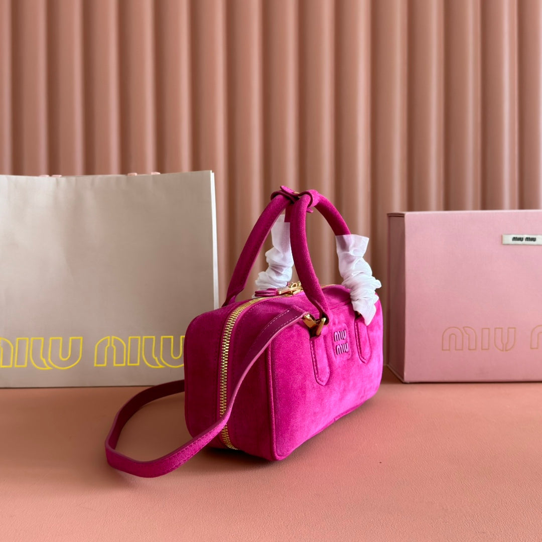 ARCADIE BAG 27 IN FUCHSIA SUEDE GOLD HARDWARE