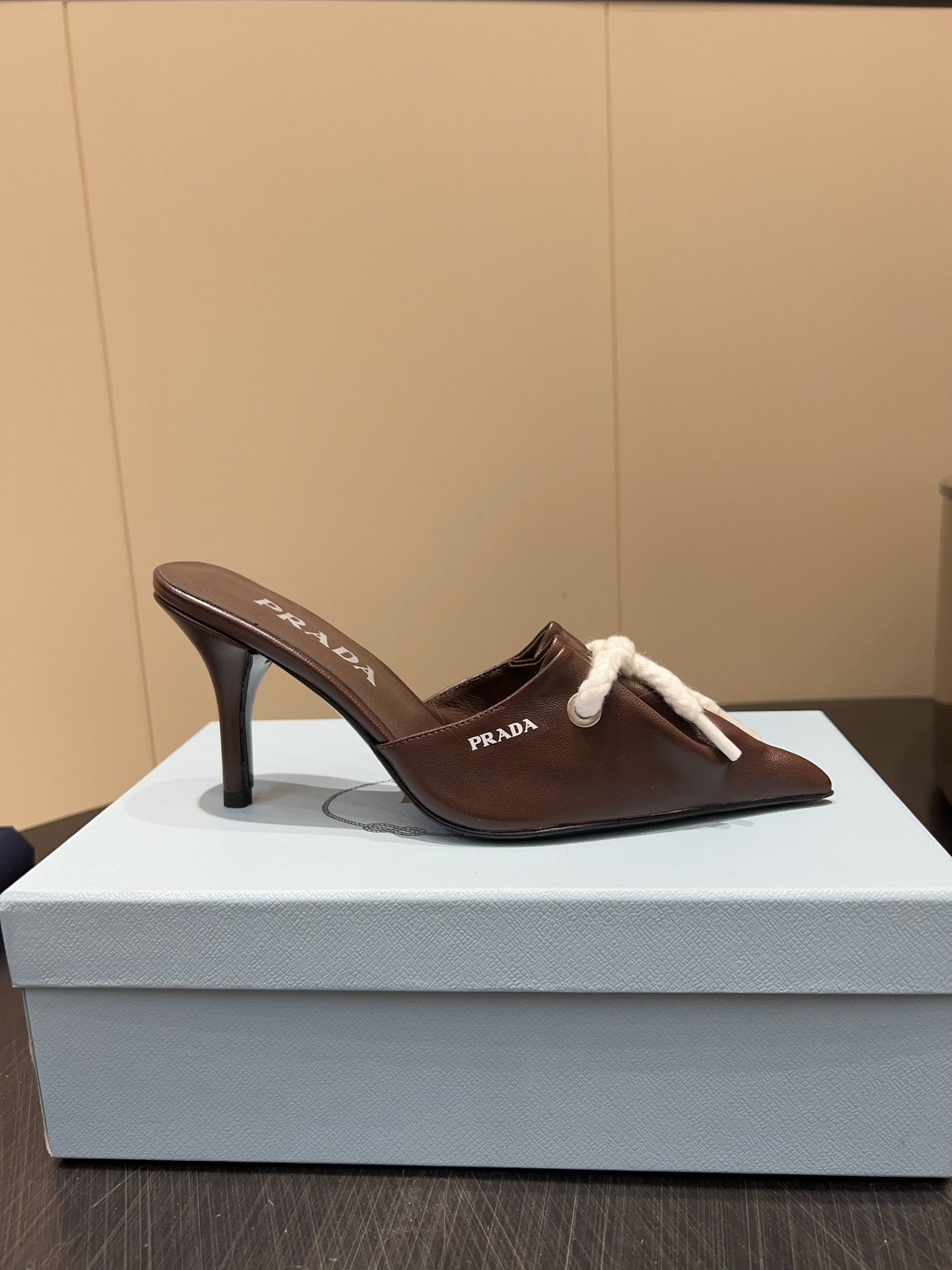 PRADA 25S BRAIDED DETAIL MULES 85MM IN DARK BROWN CALFSKIN
