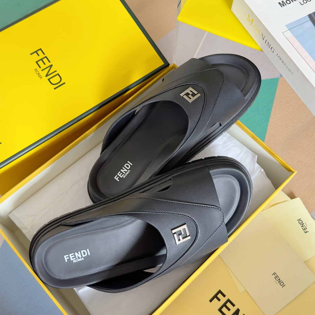 FENDI DIAGONAL ONE-STRAP SLIDE IN BLACK CALFSKIN AND RUBBER