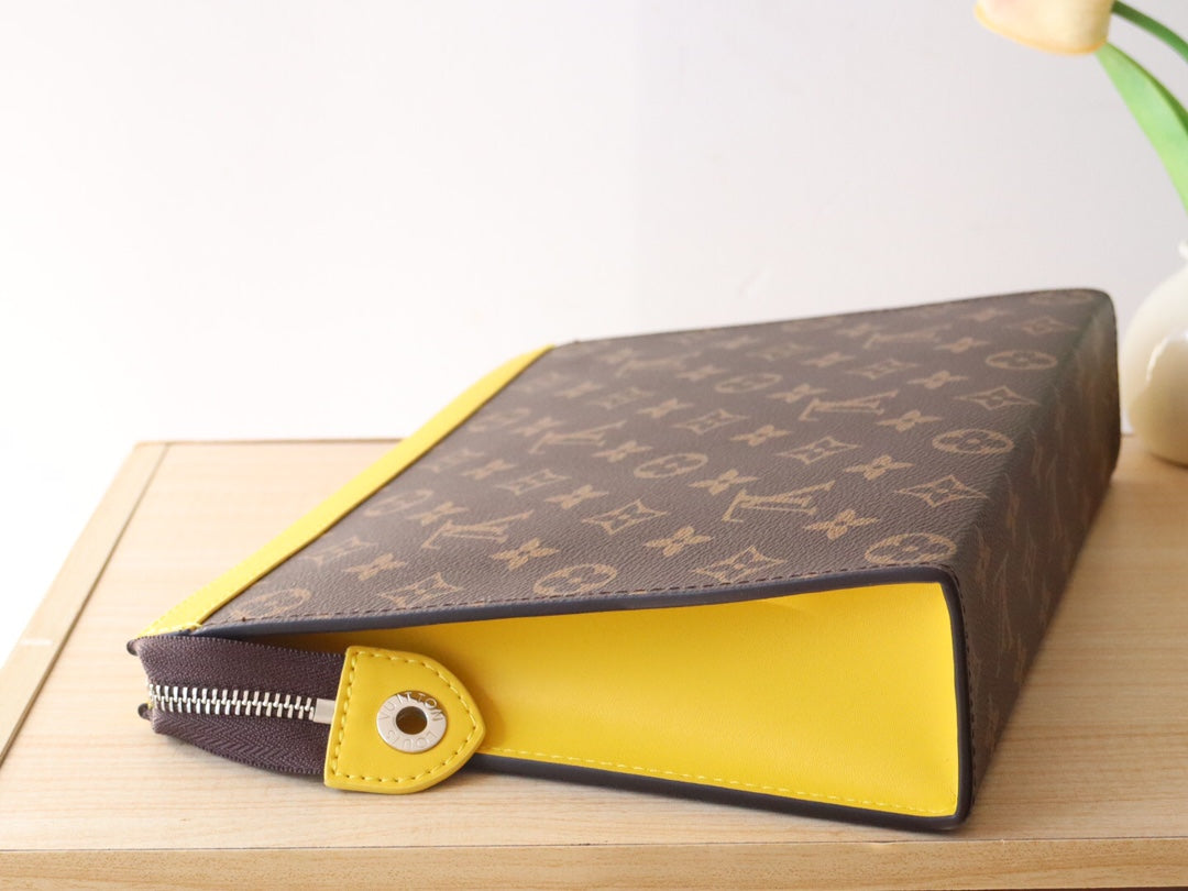LV 25S POCHETTE VOYAGE 26 IN YELLOW MONOGRAM MACASSAR COATED CANVAS