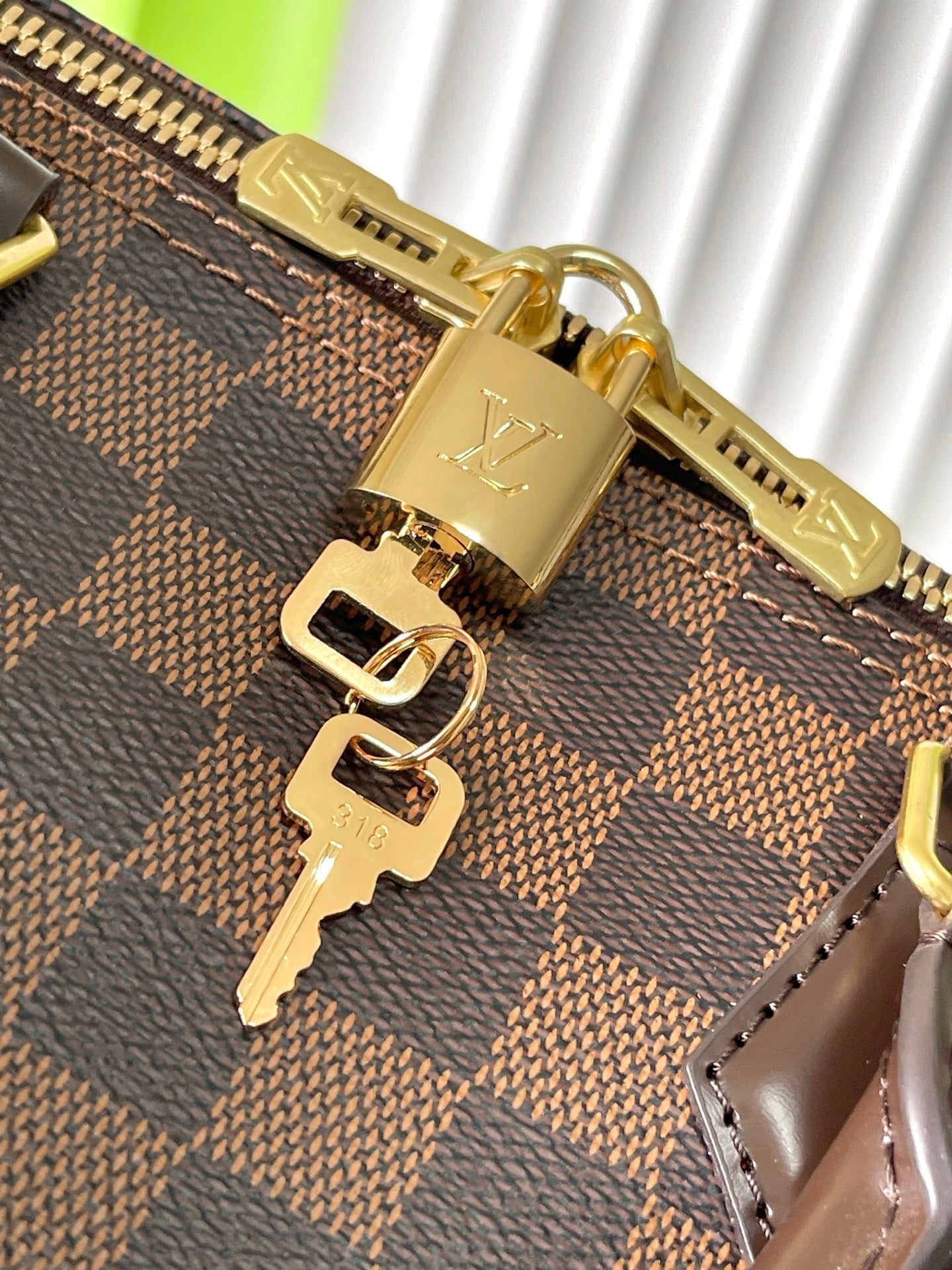 SPEEDY BANDOLIÈRE 30 IN DARK BROWN DAMIER EBENE CANVAS GOLD LOCK