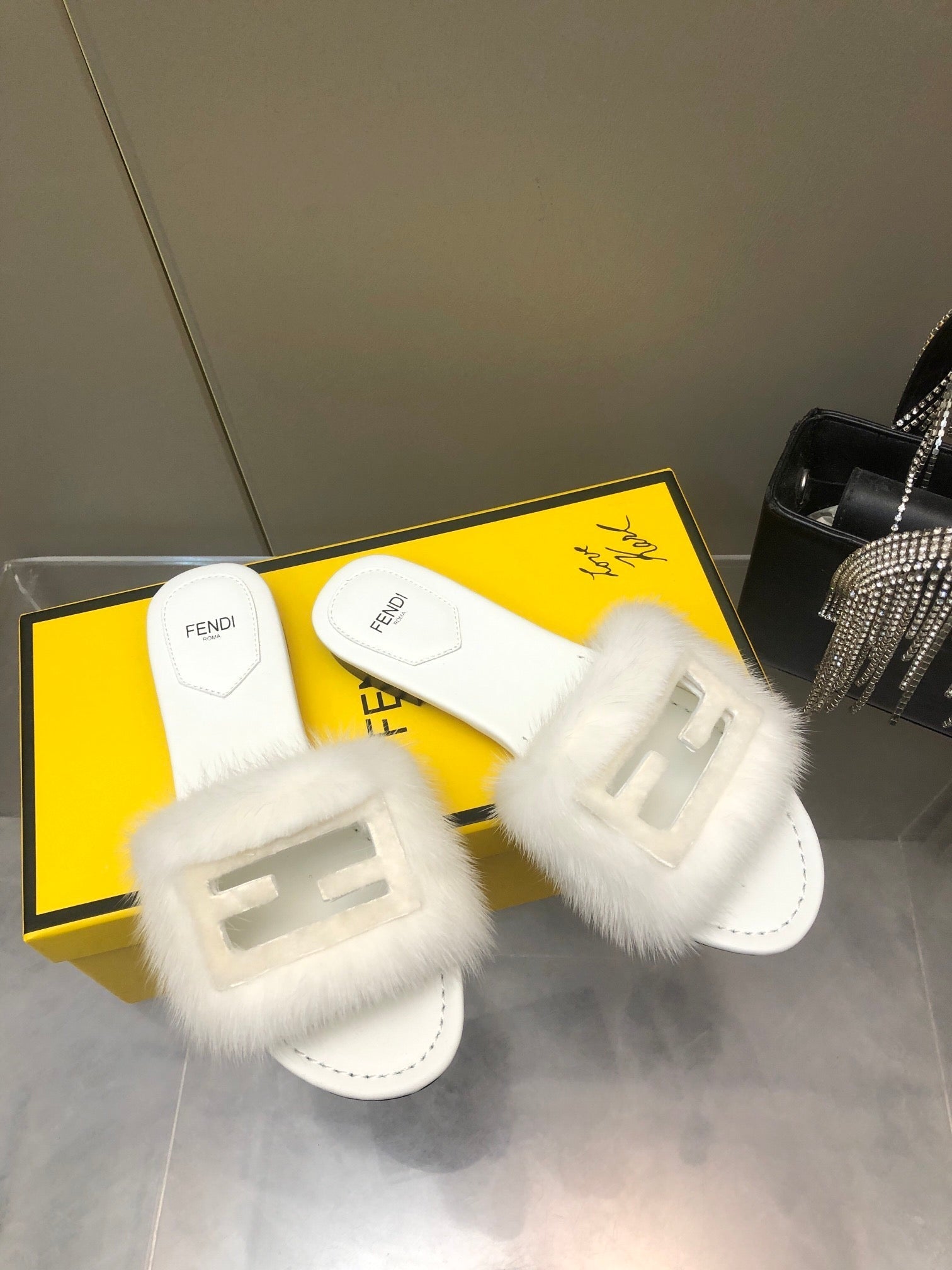 FENDI BAGUETTE MINK SLIDE SLIPPER IN WHITE FUR