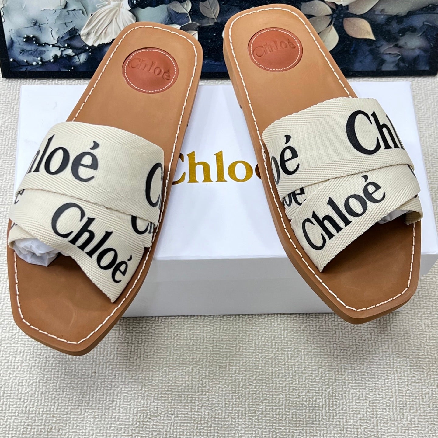 CHLOE 26S CRISSCROSS SLIDES IN BEIGE CANVAS