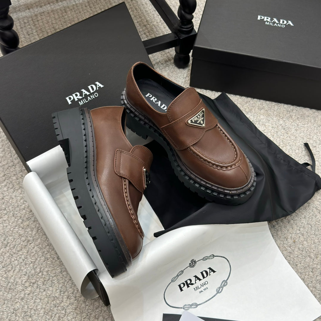 PRADA 25S LOAFER 50MM IN DARK BROWN CALFSKIN LOGO
