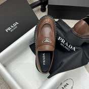 PRADA 25S LOAFER 50MM IN DARK BROWN CALFSKIN LOGO