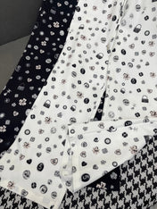 ALL-OVER LOGO PRINTED PANTS WITH STRETCH WAIST