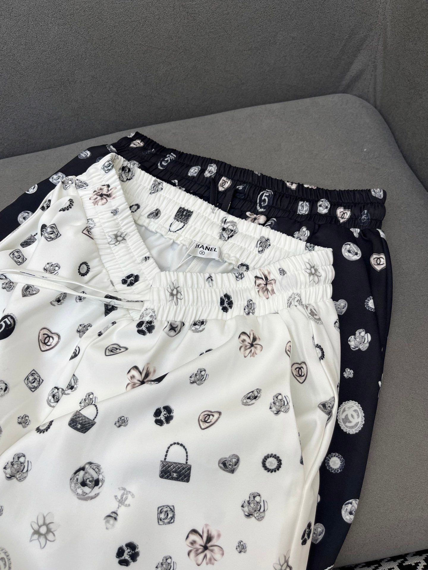ALL-OVER LOGO PRINTED PANTS WITH STRETCH WAIST
