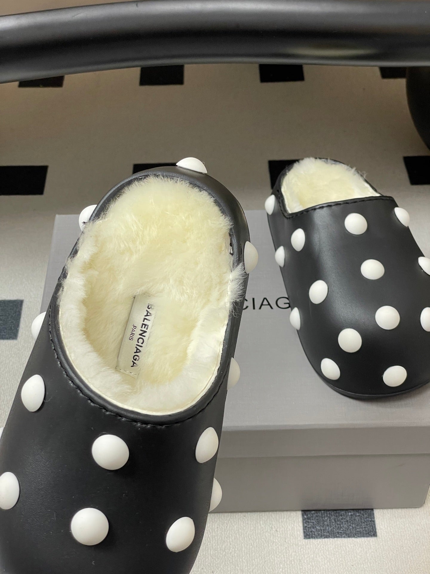 BALENCIAGA 25S FUR-LINED MULES IN BLACK AND WHITE FAUX LEATHER