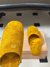 MIUMIU 26S MULE LOAFERS IN OCHRE YELLOW SUEDE LOGO