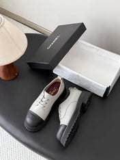 CHANEL 26S LACE UP PLATFORM IN BLACK AND GREY CALFSKIN