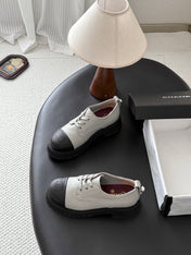 CHANEL 26S LACE UP PLATFORM IN BLACK AND GREY CALFSKIN