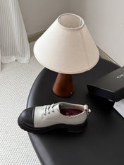 CHANEL 26S LACE UP PLATFORM IN BLACK AND GREY CALFSKIN
