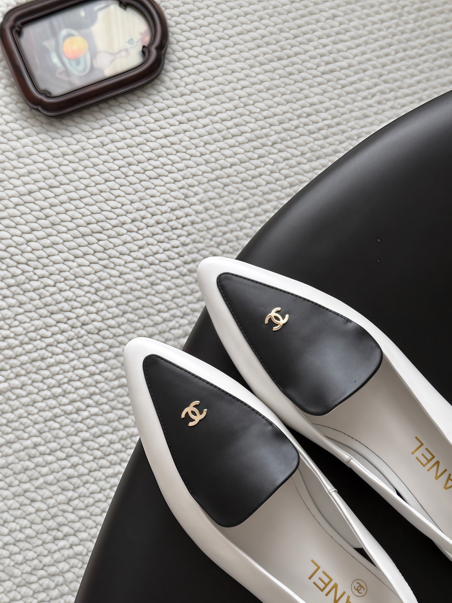 CHANEL 26S SLINGBACK FLAT IN BLACK AND WHITE CALFSKIN