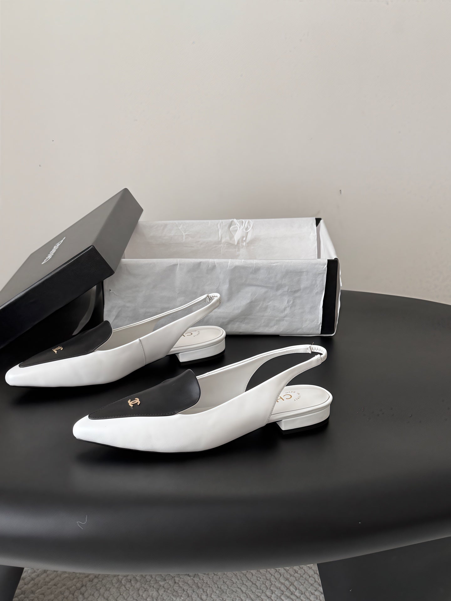 CHANEL 26S SLINGBACK FLAT IN BLACK AND WHITE CALFSKIN