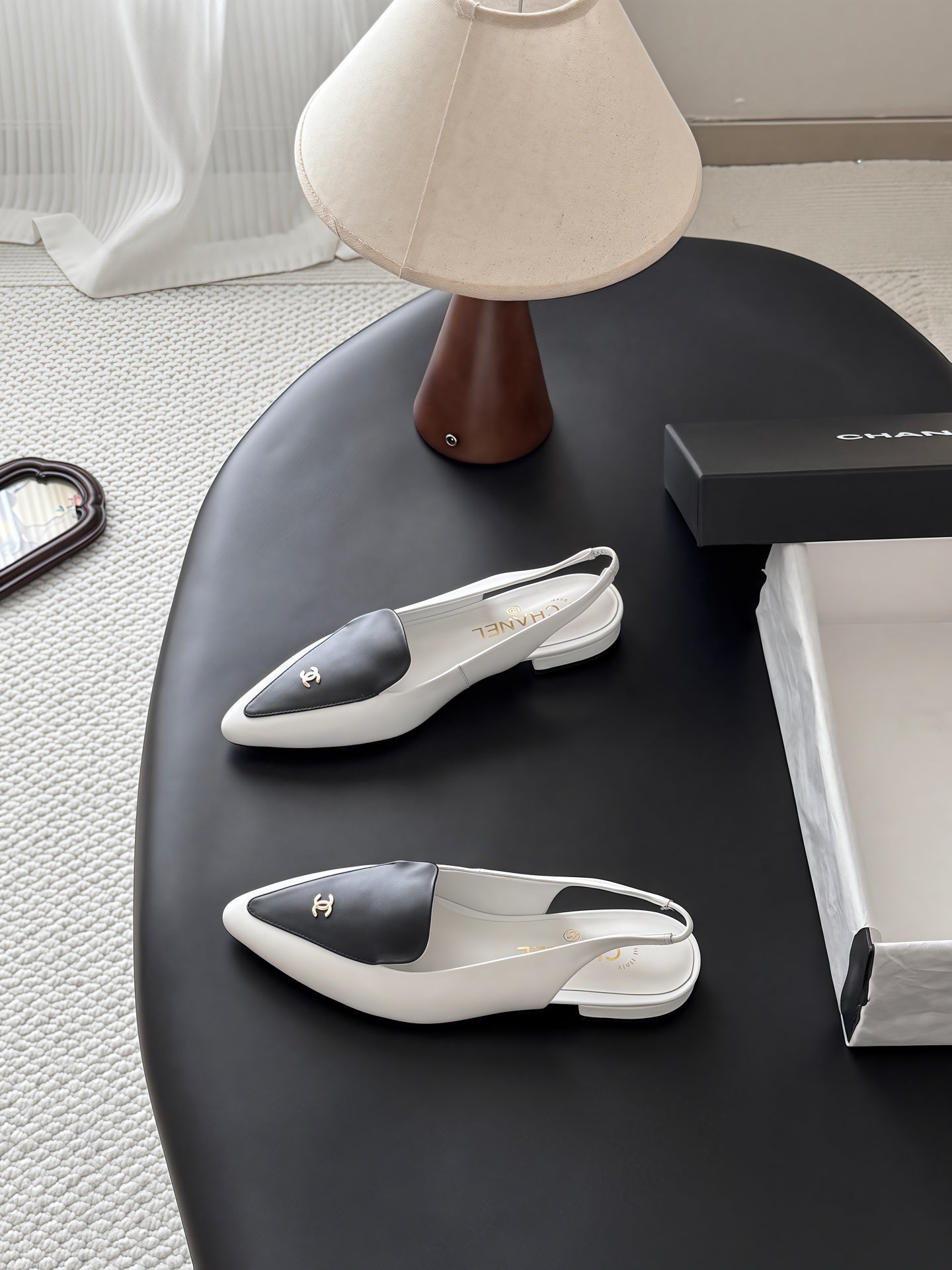 CHANEL 26S SLINGBACK FLAT IN BLACK AND WHITE CALFSKIN