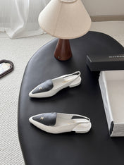 CHANEL 26S SLINGBACK FLAT IN BLACK AND WHITE CALFSKIN