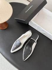 CHANEL 26S SLINGBACK FLAT IN BLACK AND WHITE CALFSKIN