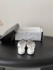 CHANEL 26S SLINGBACK FLAT IN BLACK AND WHITE CALFSKIN