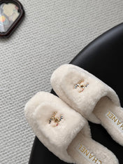 CHANEL 26S MULES IN WHITE SHEARLING LINING