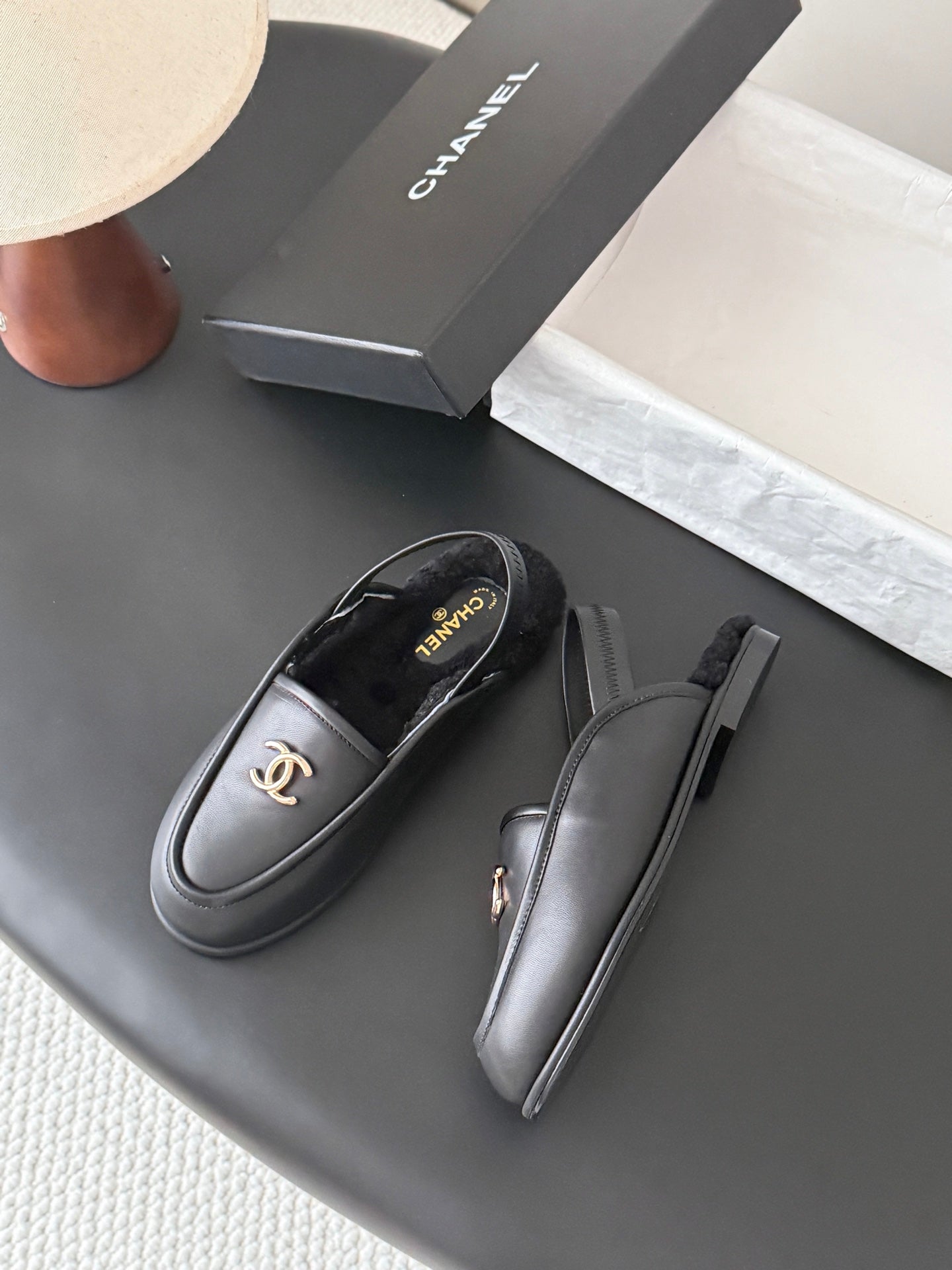 CHANEL 26S SLINGBACK LOAFERS IN BLACK CALFSKIN AND SHEARLING LINING