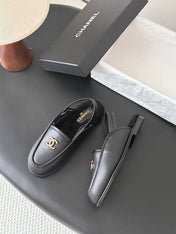 CHANEL 26S SLINGBACK LOAFERS IN BLACK CALFSKIN AND SHEARLING LINING