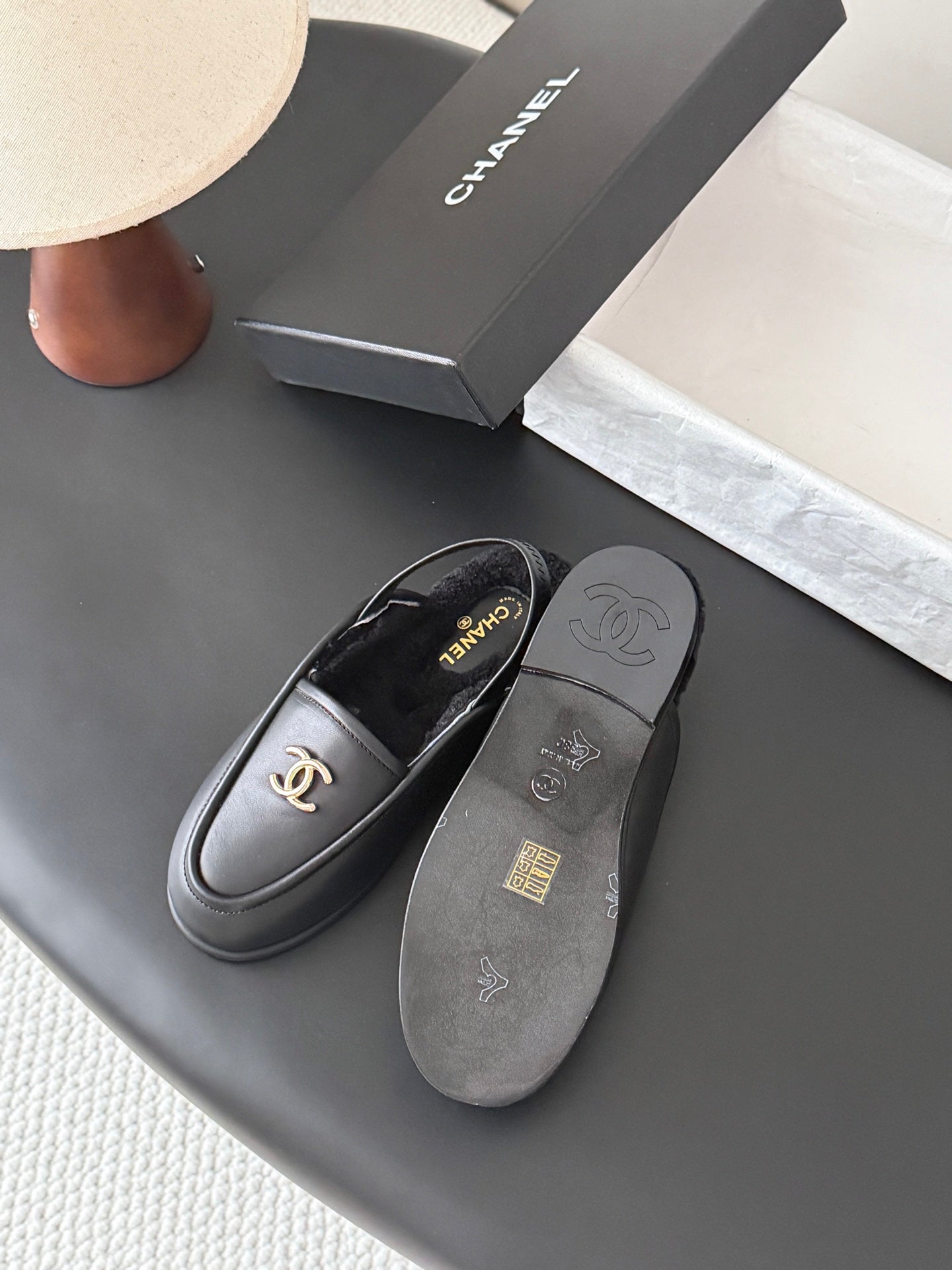 CHANEL 26S SLINGBACK LOAFERS IN BLACK CALFSKIN AND SHEARLING LINING