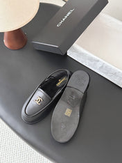 CHANEL 26S SLINGBACK LOAFERS IN BLACK CALFSKIN AND SHEARLING LINING